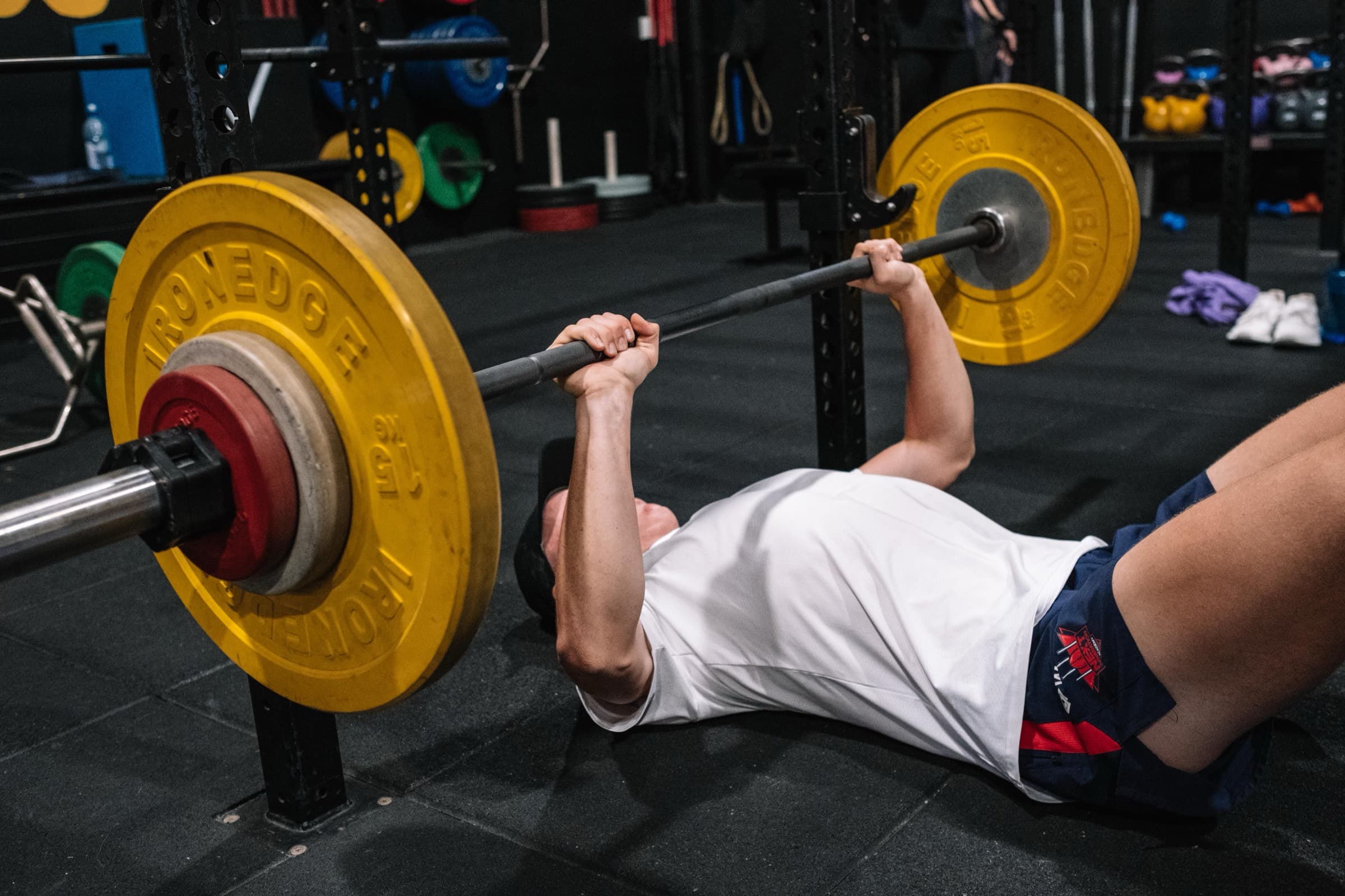 A junior athlete learning strength training